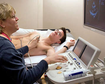 Teen boy having an echocardiogram