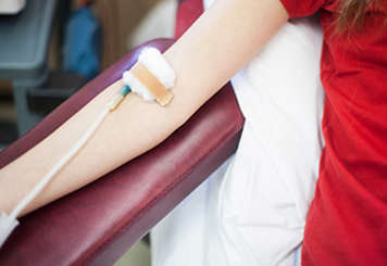 Teen girl with IV in arm