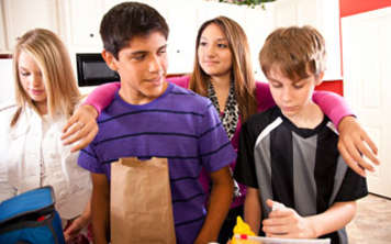 Teens preparing lunch