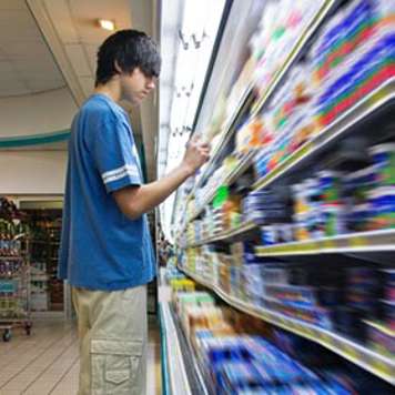 Teen boy in grocery store