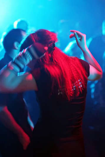 Teens dancing in nightclub