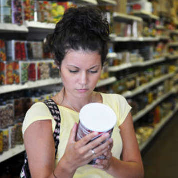 Teen girl checking ingredient list